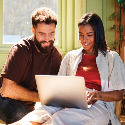 Couple-Looking-at-Computer